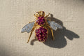 18K Gold, Ruby, and Diamond Bee Brooch ￼